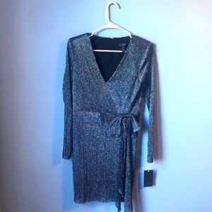 Metallic dress, size six. Brand new!
